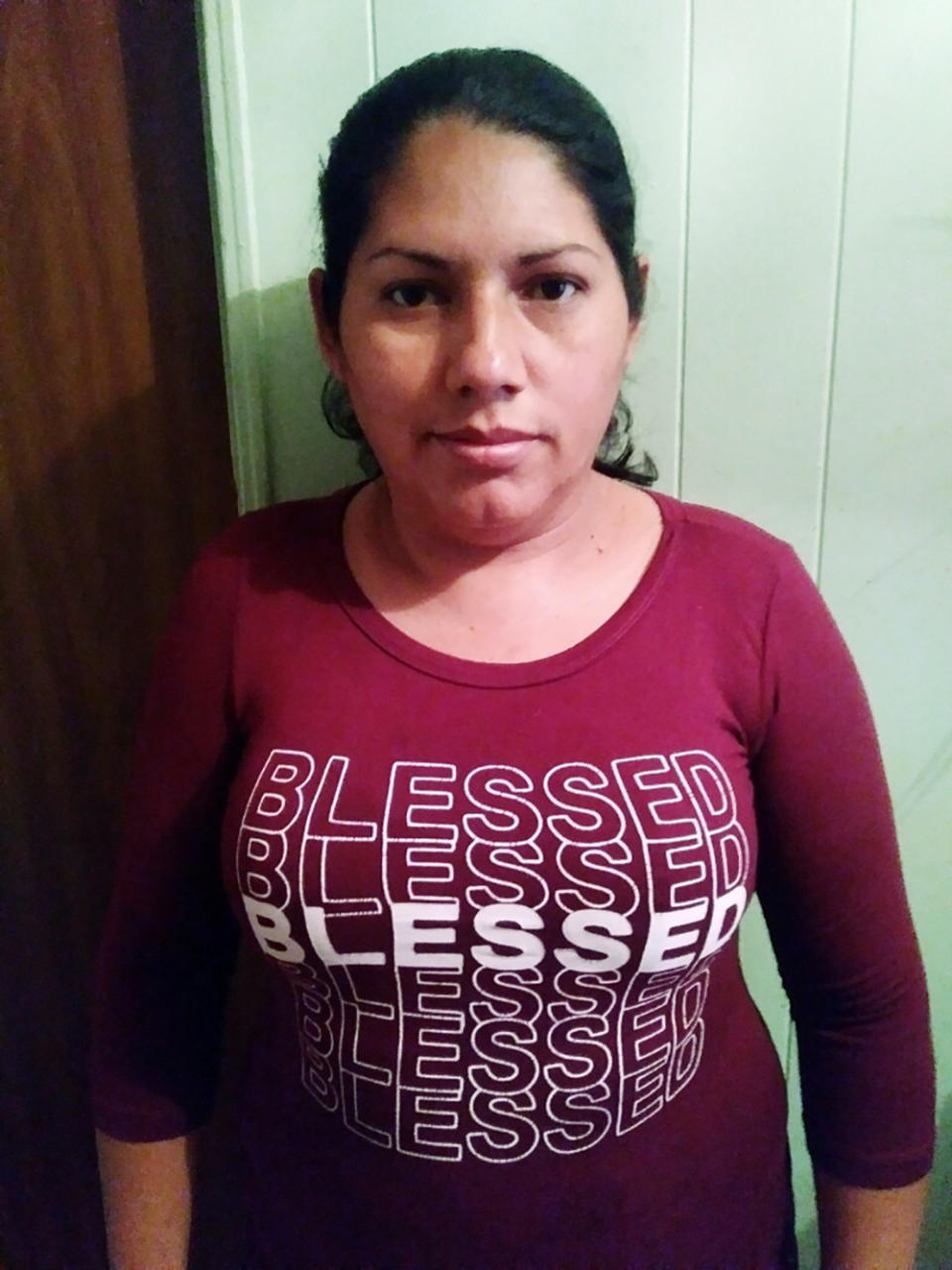 This photo provided by Itza Sanchez shows herself at her home in Richmond, Va., Tuesday, March 31, 2020. Like many people across the U.S., Sanchez says she won’t be able to make April’s rent because she’s out of work as a result of the coronavirus pandemic. (Courtesy of Itza Sanchez via AP)