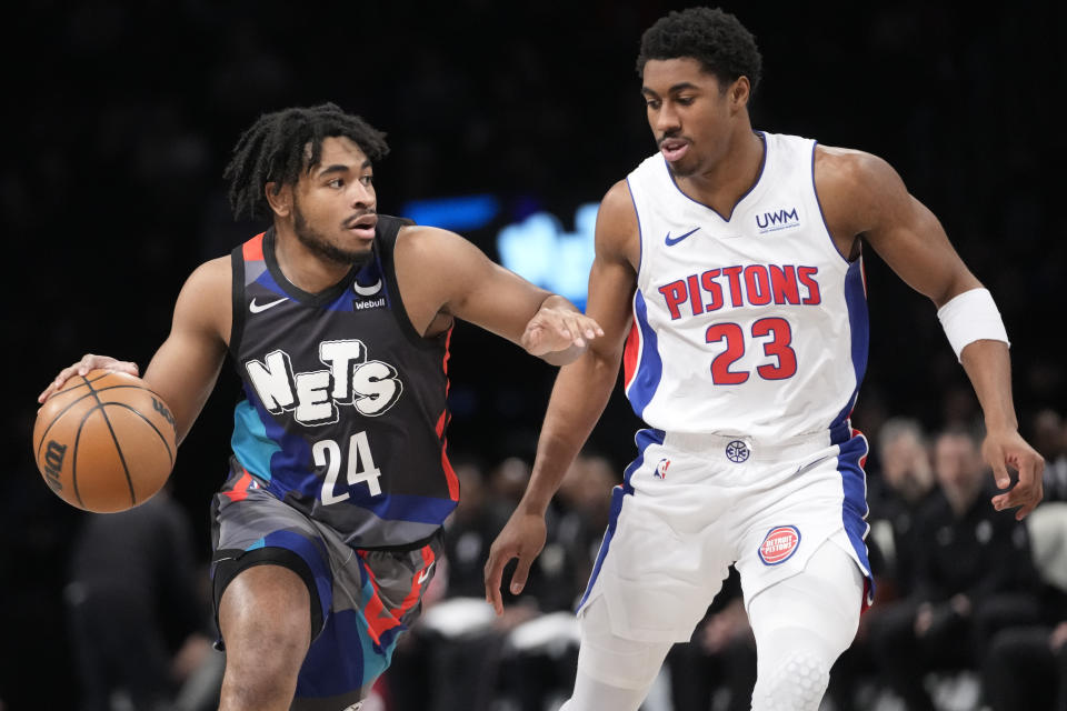 Brooklyn Nets guard Cam Thomas (24) drives against Detroit Pistons guard Jaden Ivey (23) during the first half of an NBA basketball game, Saturday, April 6, 2024, in New York. (AP Photo/Mary Altaffer)