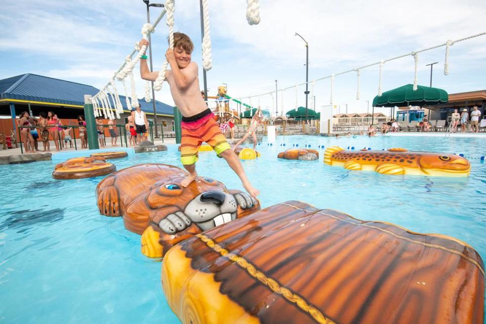 One of the three new attractions is an adventure pool with floating beaver, log and fish-shaped floats that guests can traverse using an overhead ropes course.