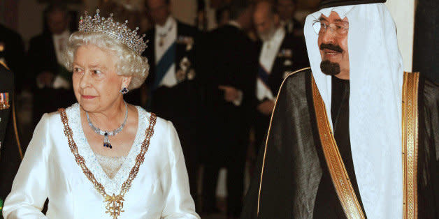 King Abdullah of Saudi Arabia, right, with Queen Elizabeth II, prior a state banquet at Buckingham Palace in London after the first day of the Saudi king's visit Tuesday Oct. 30, 2007. Britain's lavish welcome for Saudi Arabia's King Abdullah came under heavy criticism Tuesday from scathing newspaper editorials, protesters raising concerns over human rights abuses and an opposition party boycotting the visit.  (AP Photo/John Stillwell, Pool) (Photo: )