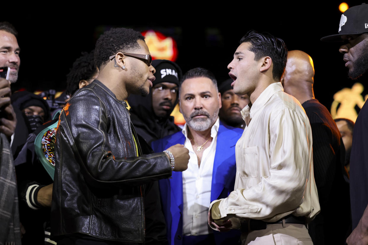 NEW YORK, NEW YORK - FEBRUARY 27: Devin Haney (L) and Ryan Garcia (R) face off during the Ryan Garcia v Devin Haney New York press tour at Palladium Times Square on February 27, 2024 in New York City. (Photo by Cris Esqueda/Golden Boy/Getty Images)