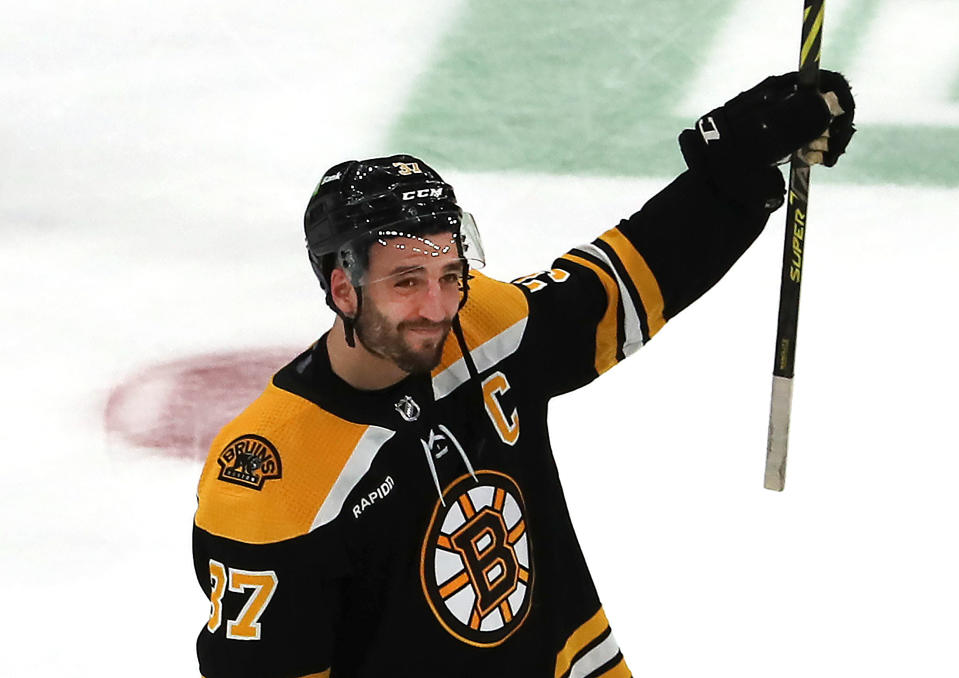 Boston, MA - April 30: Boston Bruins C Patrice Bergeron salutes the crowd after the season-ending loss. The Bruins lost to the Florida Panthers, 4-3, in overtime of Game 7 of their Eastern Conference First Round Series. (Photo by John Tlumacki/The Boston Globe via Getty Images)