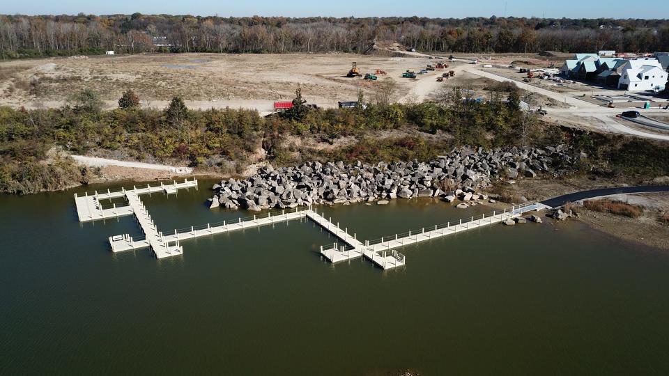 A dock will serve paddleboarders and other people using the upper lake at Quarry Trails Metro Park, which was supposed to be open by now. But it has been delayed for several reasons, including paving issues and weather. 