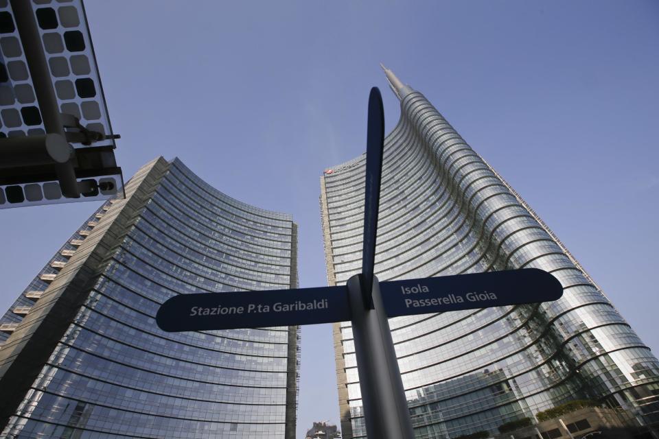 An external view of the UniCredit tower at the Porta Nuova business district in Milan, Italy, Tuesday, Dec. 13, 2016. Italy's largest bank, UniCredit, said Tuesday it will unload 17.7 billion euros ($18.8 billion) in soured loans, raise billions in new money and shed thousands of jobs as it seeks to re-launch the company under new management. (AP Photo/Luca Bruno)