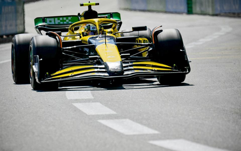 Lando Norris driving up the hill at Monaco