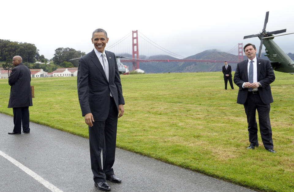 President Barack Obama stands with a view of the Golden Gate bridge before getting on Marine One in San Francisco, Thursday, April 4, 2013. Obama will be attending Democratic fundraisers while in California. (AP Photo/Susan Walsh)