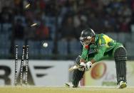 Bangladesh’s Mashrafe Mortaza is bowled out by Sri Lanka’s Lasith Malinga, during their second Twenty20 cricket match, in Chittagong, Bangladesh, Friday, Feb. 14, 2014. Sri Lanka won the match by 3 wickets. (AP Photo)