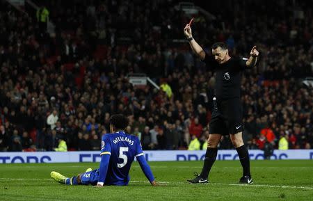 Britain Football Soccer - Manchester United v Everton - Premier League - Old Trafford - 4/4/17 Everton's Ashley Williams is shown a red card by referee Neil Swarbrick Action Images via Reuters / Jason Cairnduff Livepic