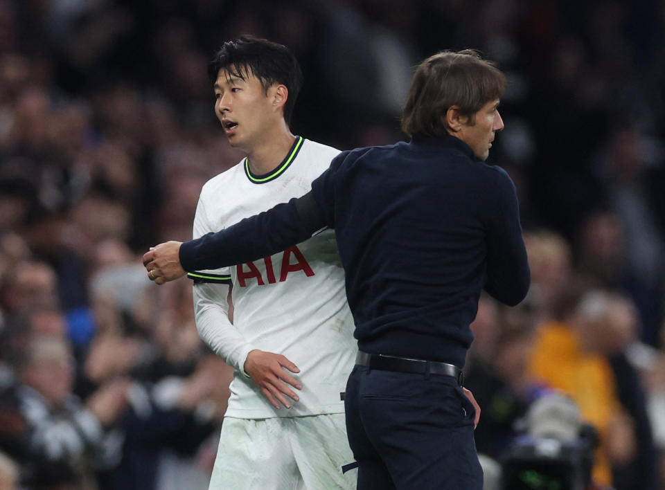 Tottenham Hotspur&#39;s Son Heung-min with manager Antonio Conte after being substituted.