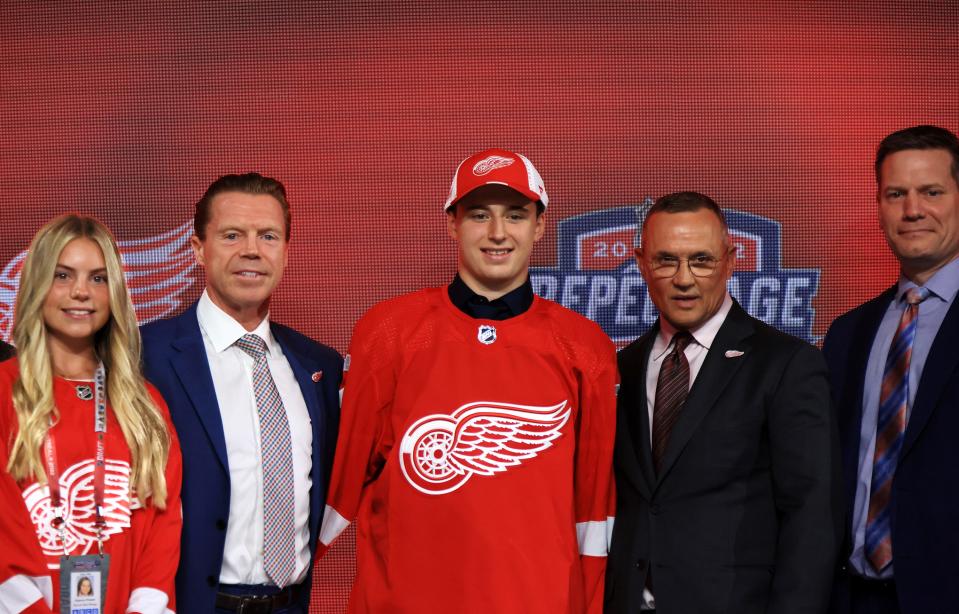 Marco Kasper drafted by the Detroit Red Wings at No. 8 overall in the 2022 NHL draft at Bell Centre on Thursday, July 7, 2022 in Montreal. At left is Kris Draper, Wings director of amateur scouting, and right is Steve Yzerman, Wings general manager.