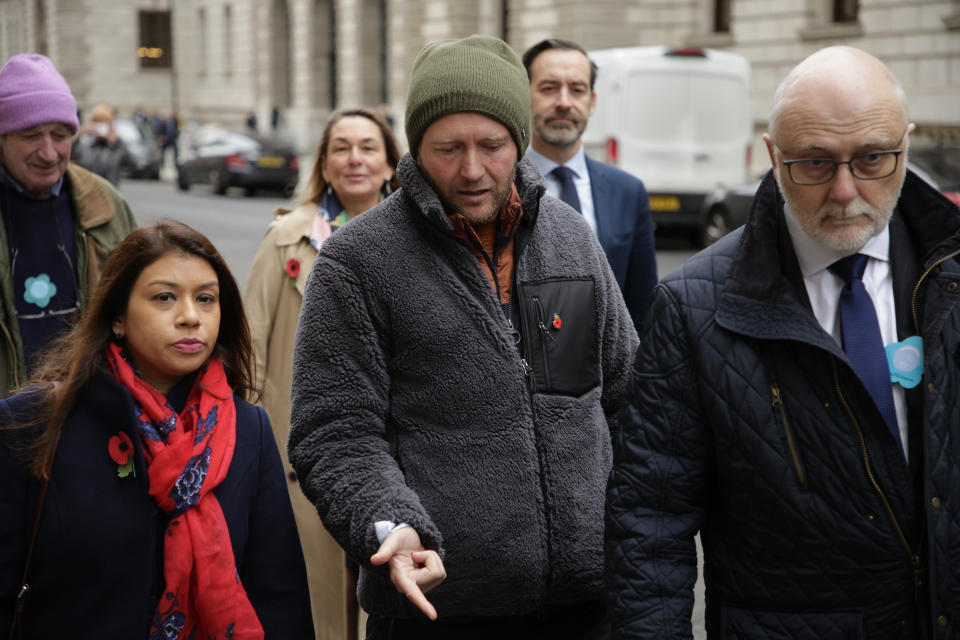 Richard Ratcliffe, husband of detained charity worker Nazanin Zaghari-Ratcliffe, walks to a meeting at the Foreign, Commonwealth and Development Office in London, Thursday, Nov. 11, 2021. Ratcliffe began a hunger strike 19 days ago after a court decided his wife has to spend another year in an Iranian prison, where she has been detained since 2016. (AP Photo/David Cliff)