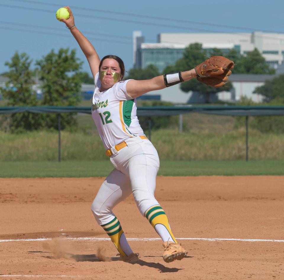 Jupiter's Sasha Seidel (12) warms up between innings during the Class 7A state softball semifinal game between Jupiter High School and Davie Western High School at Legends Way Ballfields in Clermont on Friday, May 24, 2024. [PAUL RYAN / CORRESPONDENT]