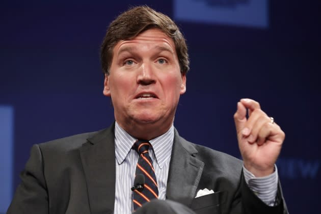 Fox News Host Tucker Carlson Appears At National Review Ideas Summit - Credit: Chip Somodevilla/Getty Images