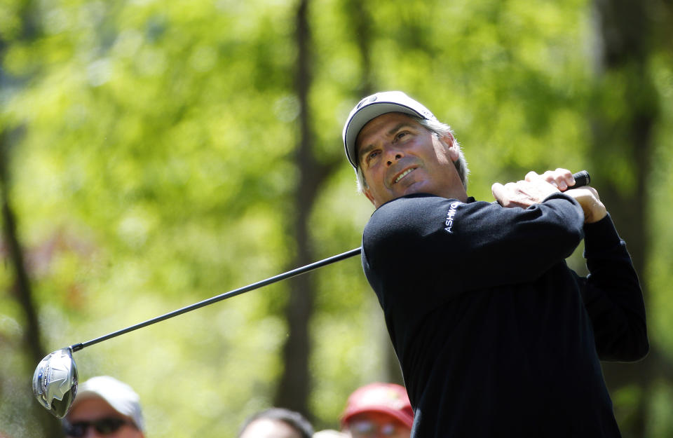 Fred Couples watches his tee shot on the third hole during the final round of play in the Greater Gwinnett Championship golf tournament of the Champions Tour, Sunday, April 20, 2014, in Duluth, Ga. (AP Photo/John Bazemore)