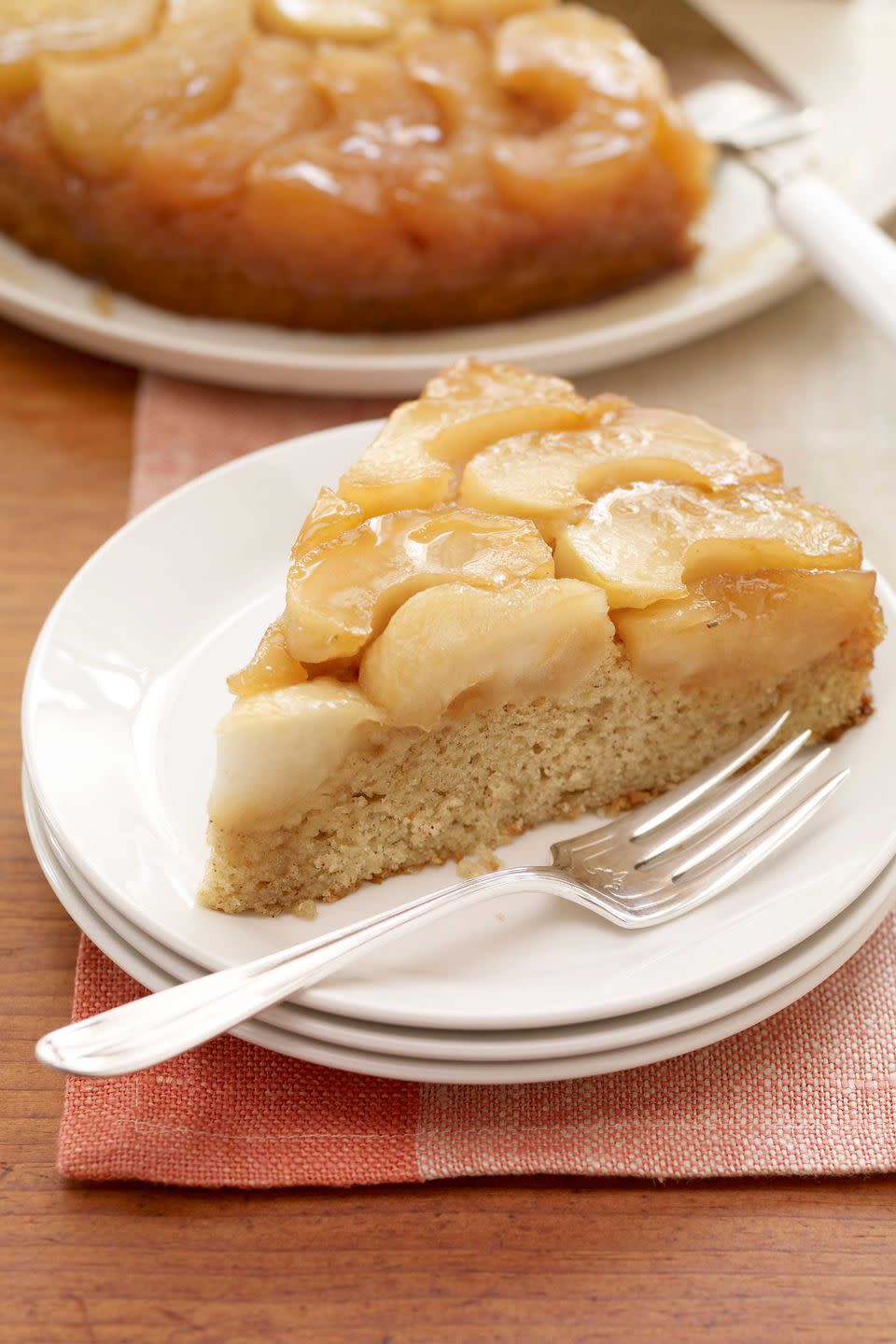 <p>With the magic of light butter, apple cider and nonfat buttermilk, this moist cake - which is like an apple version of pineapple upside-down cake - surprisingly only has 8 grams of fat per serving.<br><strong><br></strong><a rel="nofollow noopener" href="https://www.womansday.com/food-recipes/food-drinks/recipes/a10096/caramelized-apple-cake-121309/" target="_blank" data-ylk="slk:Get the recipe.;elm:context_link;itc:0;sec:content-canvas" class="link "><strong>Get the recipe.</strong></a> </p>