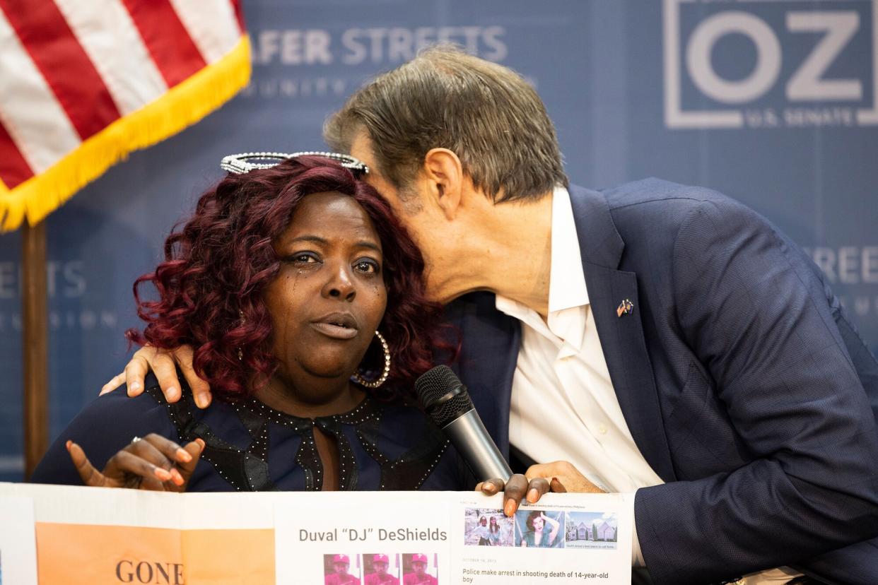 Mehmet Oz, a Republican candidate for U.S. Senate in Pennsylvania, embraces Sheila Armstrong, 45, who lost her brother to gun violence at House of Glory Philly CDC in Philadelphia Election 2022 Pennsylvania Senate, Philadelphia, United States - 19 Sep 2022