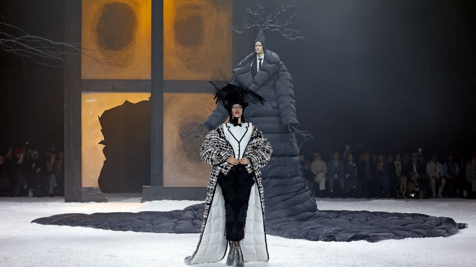 Model Anna Cleveland walks during Thom Browne's theatrical runway show, which took inspiration from Edgar Allan Poe's "The Raven." Cleveland embodied the titular bird. - Taylor Hill/WireImage/Getty Images