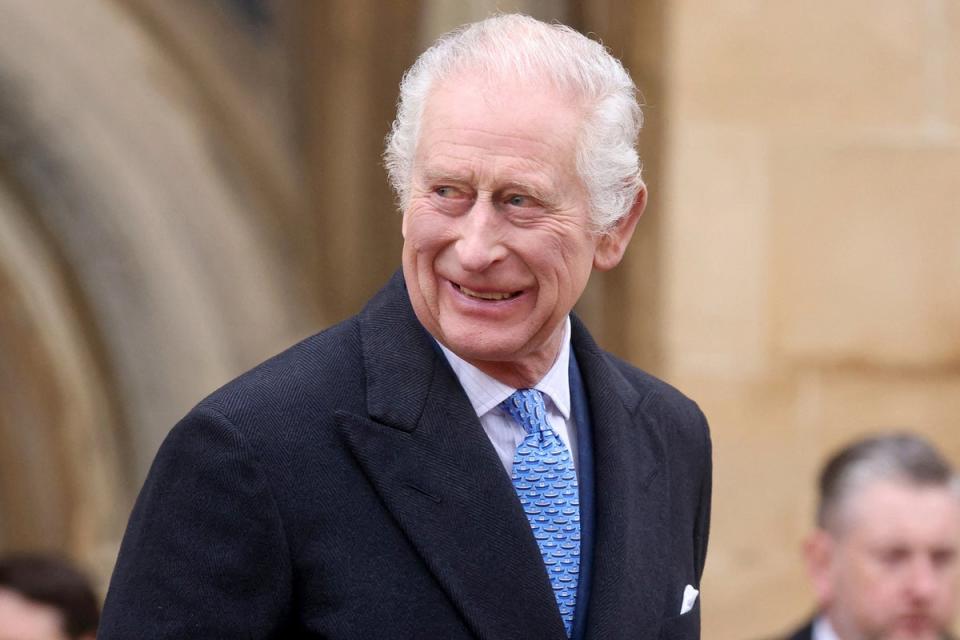 King Charles was said to be ‘in good spirits’ as he spoke to well-wishers outside Windsor Castle (AP)