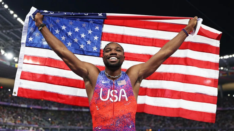 PHOTO: Noah Lyles of the U.S celebrates winning the gold medal in the men's 100m final at the 2024 Paris Olympic Games, Aug. 4, 2024. (Christian Petersen/Getty Images)