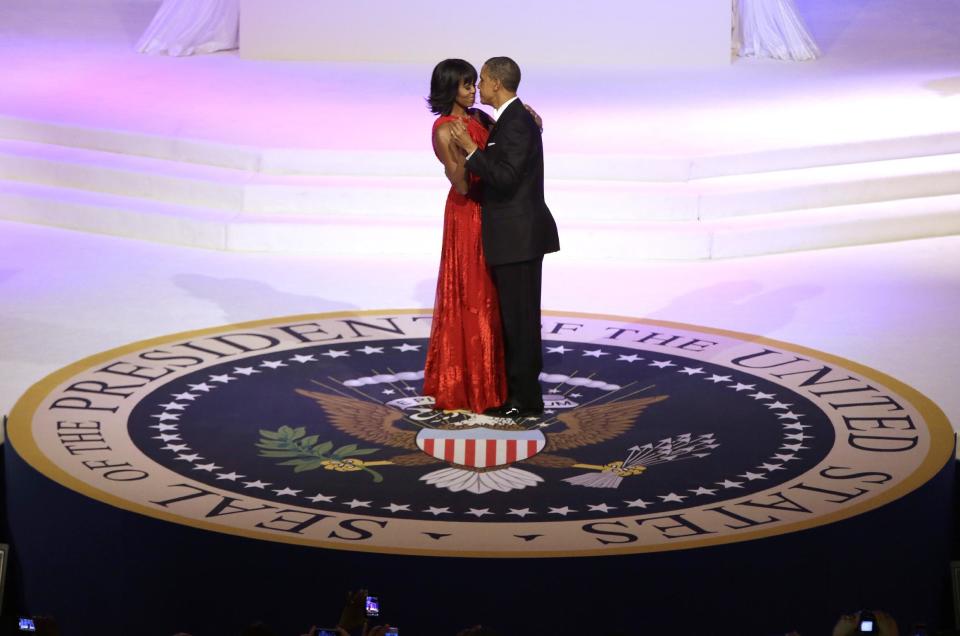 President Barack Obama and first lady Michelle Obama dance during the Commander-In-Chief Inaugural ball at the Washington Convention Center during the 57th Presidential Inauguration Monday, Jan. 21, 2013 in Washington. (AP Photo/ Evan Vucci)