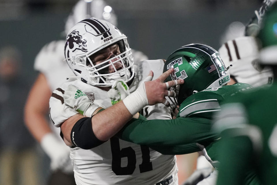 Western Michigan offensive lineman Mike Caliendo plays during the first half of an NCAA college football game against Eastern Michigan, Tuesday, Nov. 16, 2021, in Ypsilanti, Mich. (AP Photo/Carlos Osorio)