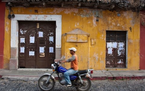 "I haggle over the motorcycle, which has no paperwork and dangerously bald tyres" - Credit: ALAMY