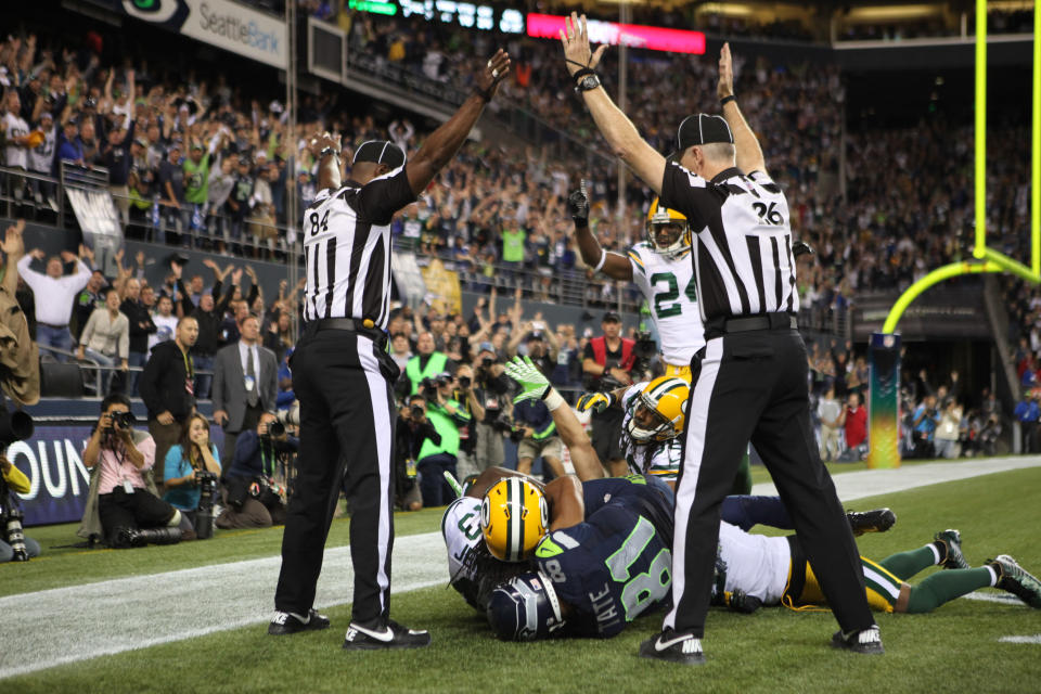 SEATTLE, WA - SEPTEMBER 24: Wide receiver Golden Tate #81 of the Seattle Seahawks makes a catch in the end zone to defeat the Green Bay Packers on a controversial call by the officials at CenturyLink Field on September 24, 2012 in Seattle, Washington. (Photo by Otto Greule Jr/Getty Images)