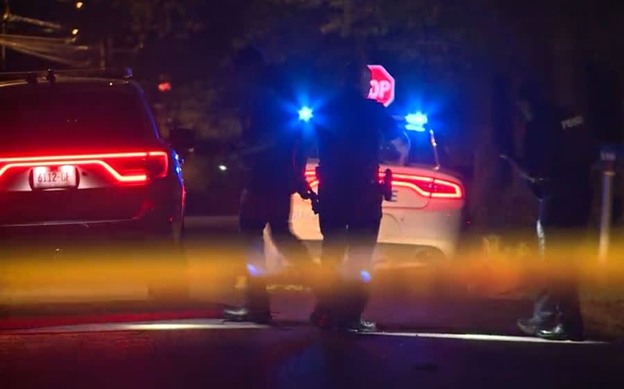 Officers work the scene in Southwest Memphis early Friday.