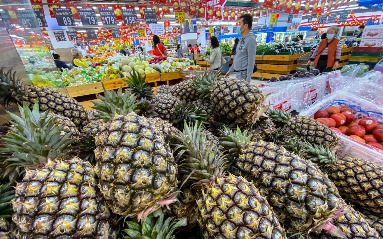 Pineapples on display at a grocery store in Taipei - RITCHIE B TONGO/EPA-EFE/Shutterstock 