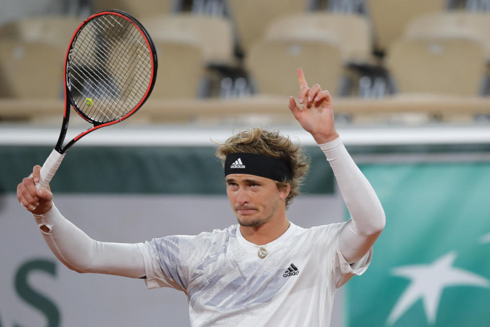 Germany's Alexander Zverev gestures after playing a shot against Austria's Dennis Novak in the first round match of the French Open tennis tournament at the Roland Garros stadium in Paris, France, Sunday, Sept. 27, 2020. (AP Photo/Christophe Ena)