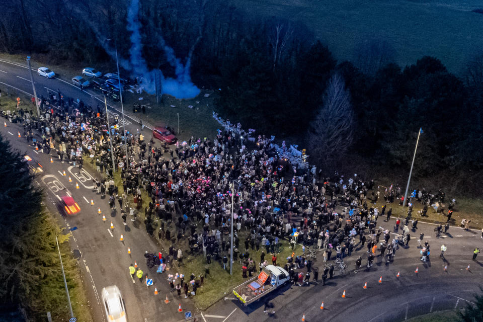 People attend a vigil in the St Mellons area of Cardiff, in memory of Eve Smith, 21, Darcy Ross, 21, and Rafel Jeanne, 24, who died in a road traffic accident, while Sophie Russon, 20, and Shane Loughlin, 32, survived but remain in a critical condition. Picture date: Tuesday March 7, 2023. (Photo by Ben Birchall/PA Images via Getty Images)