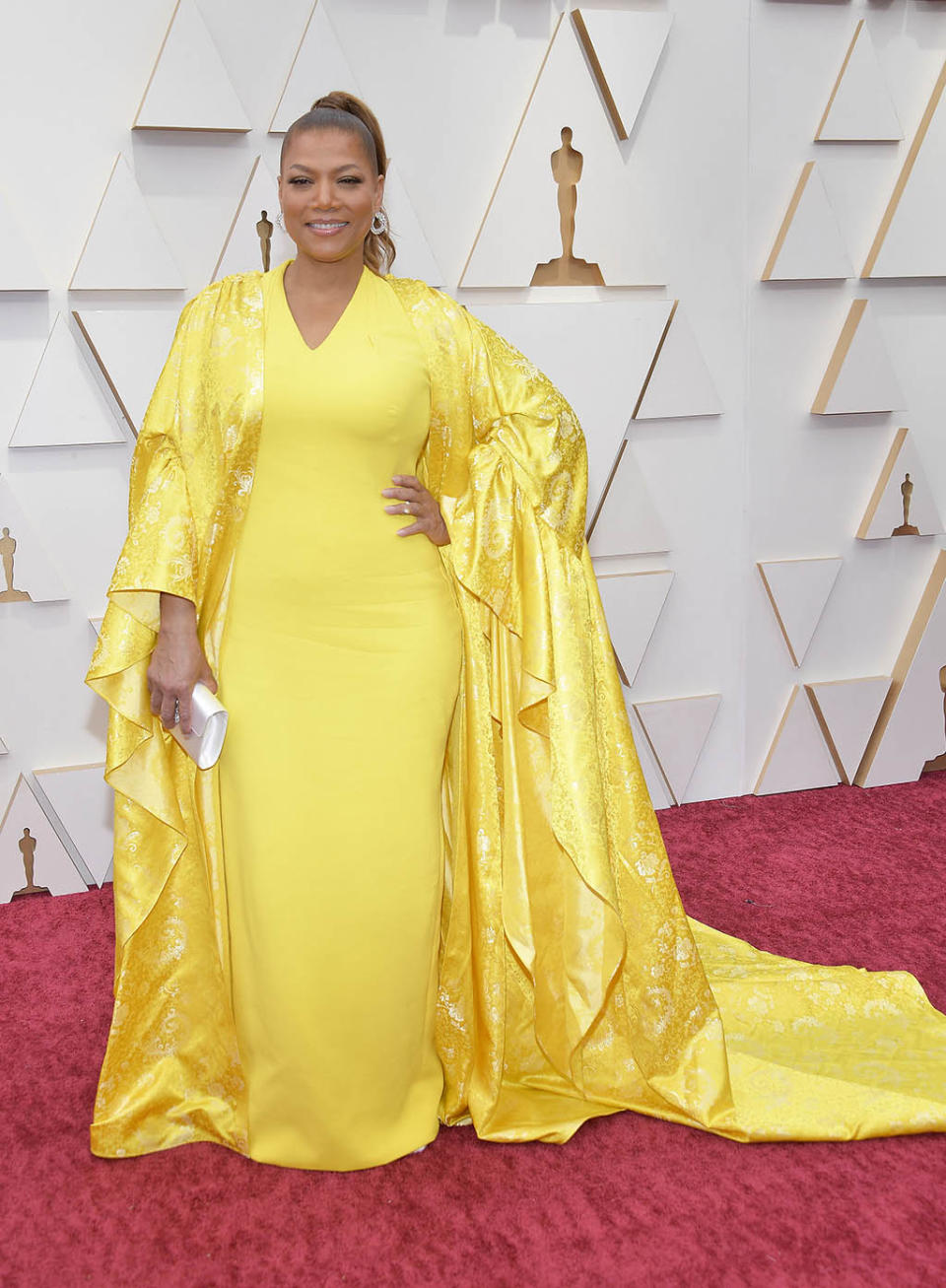 Queen Latifah Glows in Elegant Yellow Halter Dress & Sparkling Shawl at
