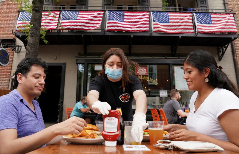 FILE PHOTO: Restaurants serve customers outside as Phase One of reopening begins in Northern Virginia