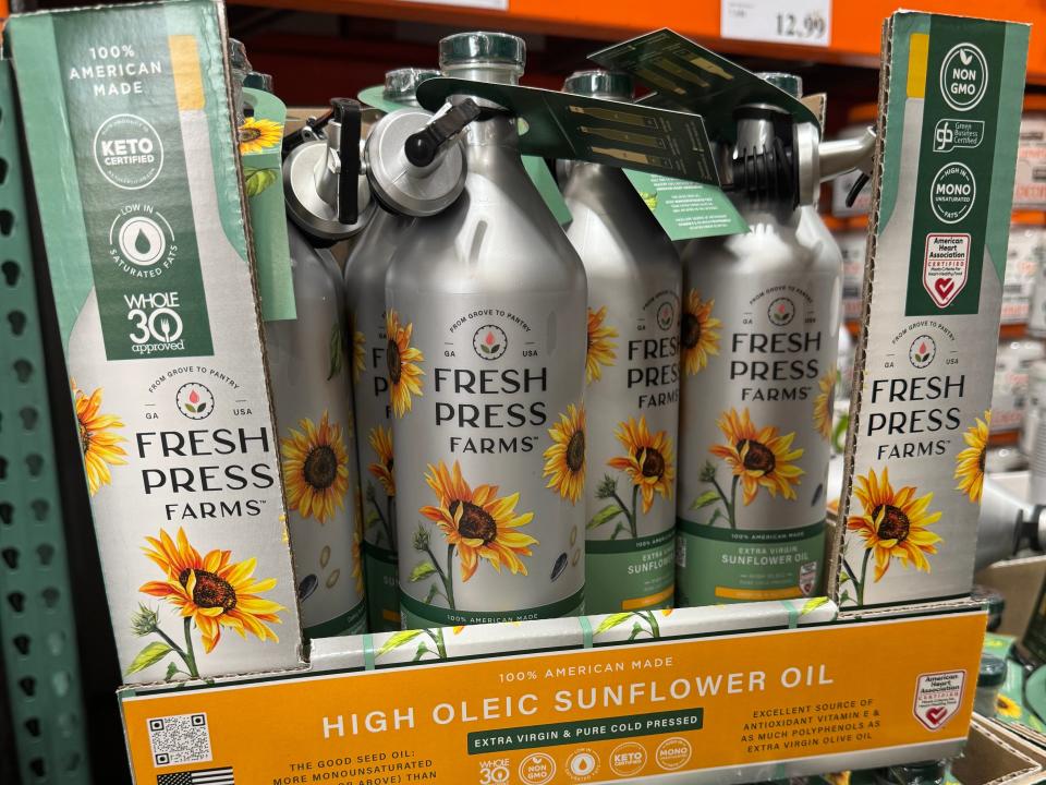 Fresh Press Farms sunflower oil in silver bottles on display at Costco
