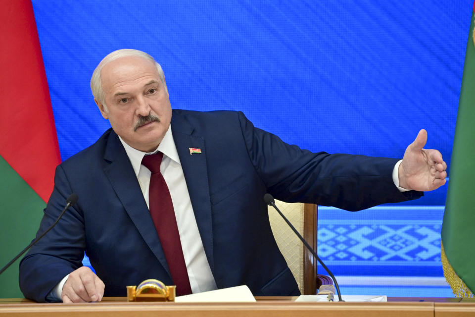 Belarusian President Alexander Lukashenko gestures while speaking during an annual press conference in Minsk, Belarus, Monday, Aug. 9, 2021.Belarus' authoritarian leader on Monday charged that the opposition was plotting a coup in the runup to last year's presidential election that triggered a monthslong wave of mass protests. President Alexander Lukashenko held his annual press conference on Monday, the one-year anniversary of the vote that handed him a sixth term in office but was denounced by the opposition and the West as rigged. (Andrei Stasevich /BelTA photo via AP)