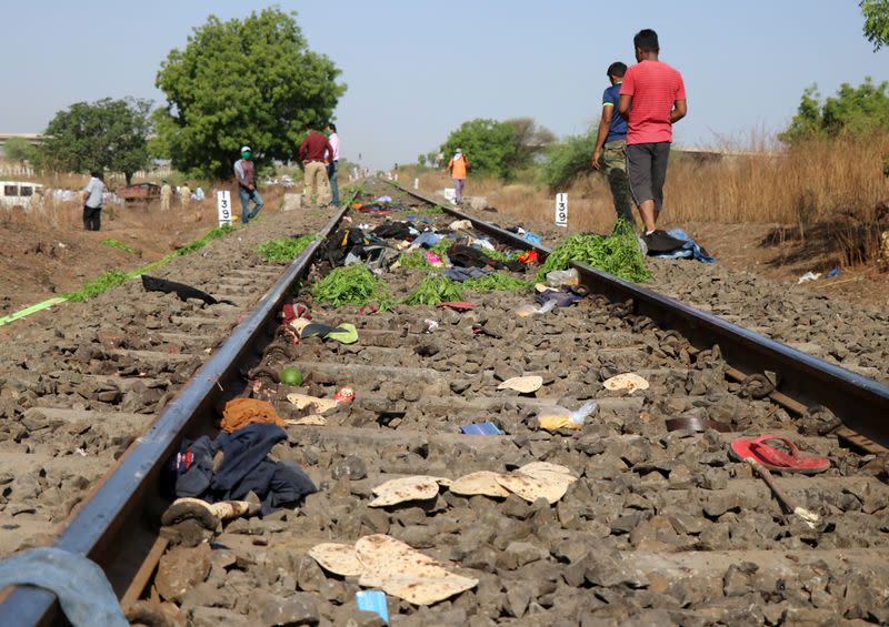 Belongings of the victims lie scattered on the railway track after a train ran over migrant workers sleeping on the track in Aurangabad district