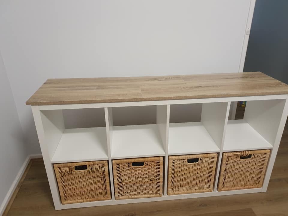 A savvy DIYer has made their plain Ikea storage cube 'so much nicer' with an $8 Bunnings buy. Photo: Facebook (supplied).