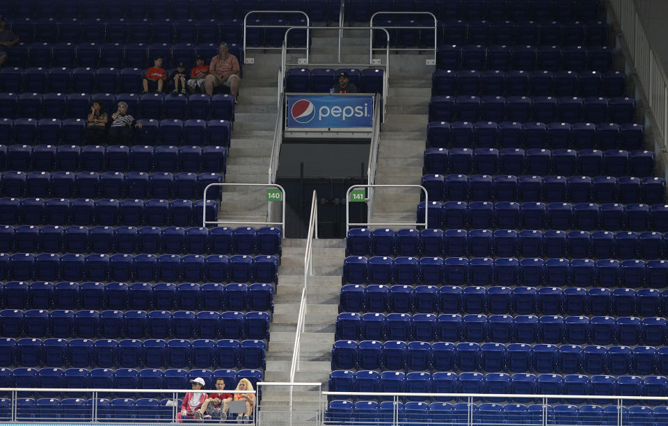 Empty seats as the Colorado Rockies play against the Miami Marlins during the sixth inning at Marlins Park on April 3, 2014 in Miami, Florida. The Marlins defeated the Rockies 8-5. (Photo by Marc Serota/Getty Images)