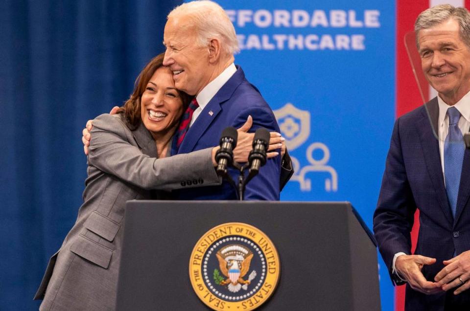 Vice President Kamala Harris, President Joe Biden and Gov. Roy Cooper join eachother on stage after speeches on heath care during a campaign stop at the Chavis Community Center in Raleigh on Tuesday, March 26, 2024.
