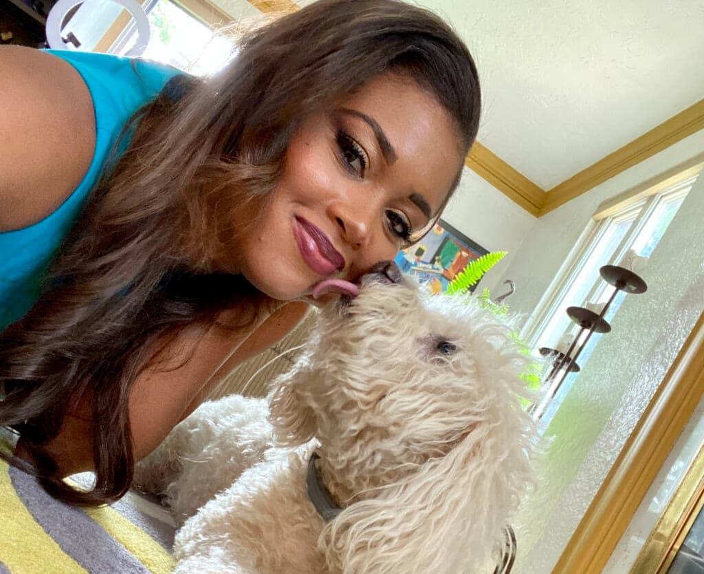AJ Ross and Kobe share a tender moment. Ross said she filed a wrongful lawsuit against PetSmart in connection with Kobe’s death because she did not want her beloved pooch’s death to be in vain. (Credit: AJ Ross)