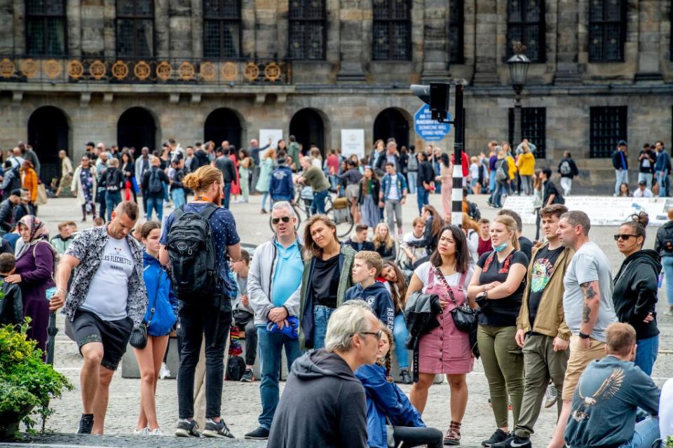 A tour group in Amsterdam this month - getty