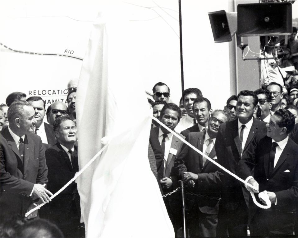 President Lyndon B. Johnson, left, and Mexican President Adolfo López Mateos, right, prepare to unveil the shining chrome monument marking the new boundary of Mexico and the United States near Bowie High School in this Sept. 25, 1964, photograph. Following the ceremony, the presidents were given two framed artistic renderings symbolizing settlement of the Chamizal dispute.
