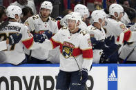 Florida Panthers center Carter Verhaeghe (23) celebrates with the bench following his goal against the Tampa Bay Lightning during the second period in Game 4 of an NHL hockey Stanley Cup first-round playoff series, Saturday, April 27, 2024, in Tampa, Fla. (AP Photo/Chris O'Meara)