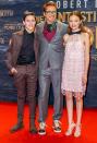 <em>Dolittle</em> costars Harry Collett, Robert Downey Jr. and Carmel Laniado, attend the film's premiere in Berlin, Germany on Sunday. 