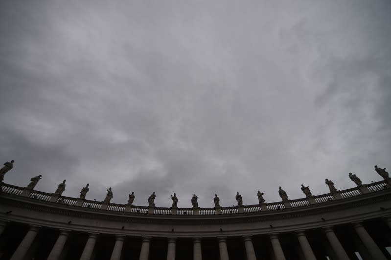 Statues are seen on a rainy day in Saint Peter's Square at the Vatican