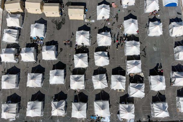 PHOTO: An aerial picture shows a make-shift shelter for people who were left homeless, near the rebel-held town of Jindayris, Feb. 9, 2023, two days after a deadly earthquake hit Turkey and Syria. (Rami Al Sayed/AFP via Getty Images)