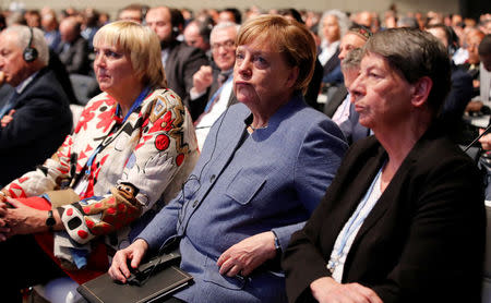 Claudia Roth of the German Green Party, German Chancellor Angela Merkel and Barbara Hendricks Federal Minister for the Environment, Nature Conservation, Building and Nuclear Safety attend the COP23 U.N. Climate Change Conference in Bonn, Germany, November 15, 2017. REUTERS/Wolfgang Rattay