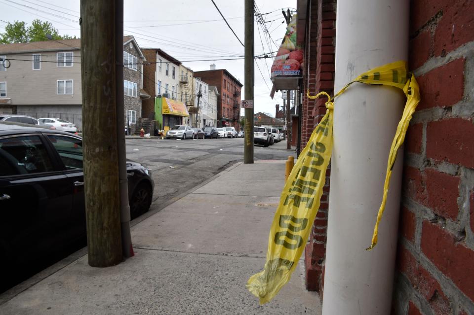 A teenage girl was shot and killed and several other people were wounded after gunfire on the corner of Essex and Madison streets in Paterson just before 10:30 p.m. on Wednesday night May 11, 2022. On Thursday morning, torn down police take and spray painted letters could be seen in the area of the fatal shooting.
