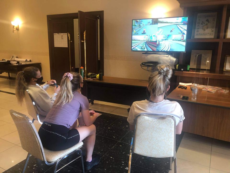 Australian softball players passing time by playing Nintendo Switch in their hotel in Ota, Japan.<span class="copyright">Photo courtesy of Softball Australia</span>