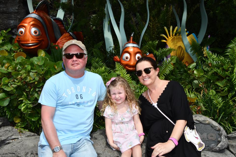 Cabin crew member Fiona Ackerman with her husband and colleague Alastair and daughter Isla. Photo: Family handout / Yahoo Finance UK